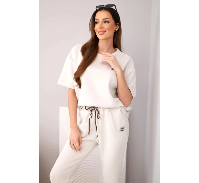 Dámský viskózový komplet máslový s krátkým rukávem a kalhotami s ohrnutou nohavicí světle béžový