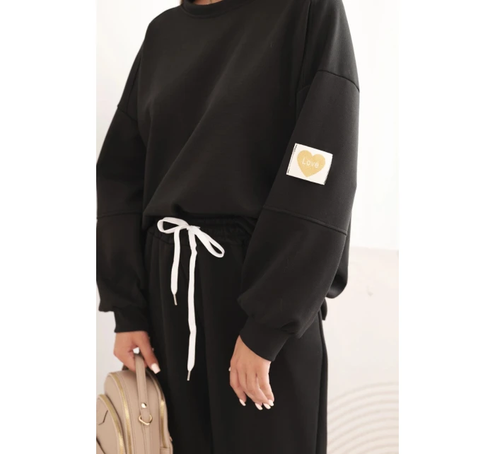 Dámský set máslový s volnou mikinou a kalhotami s nápisem LOVE černý Dámský set máslový s volnou mikinou a kalhotami s nápisem LOVE černý