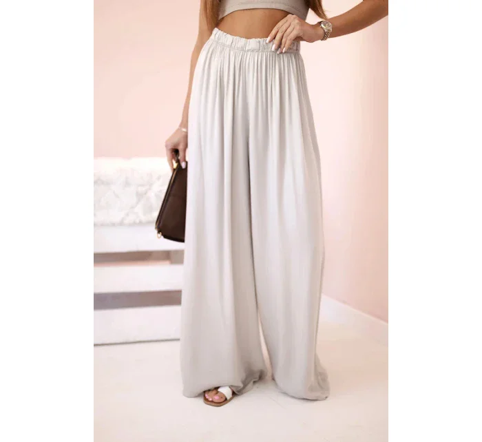 Široké dámské kalhoty s elastickým pasem tmavě béžová