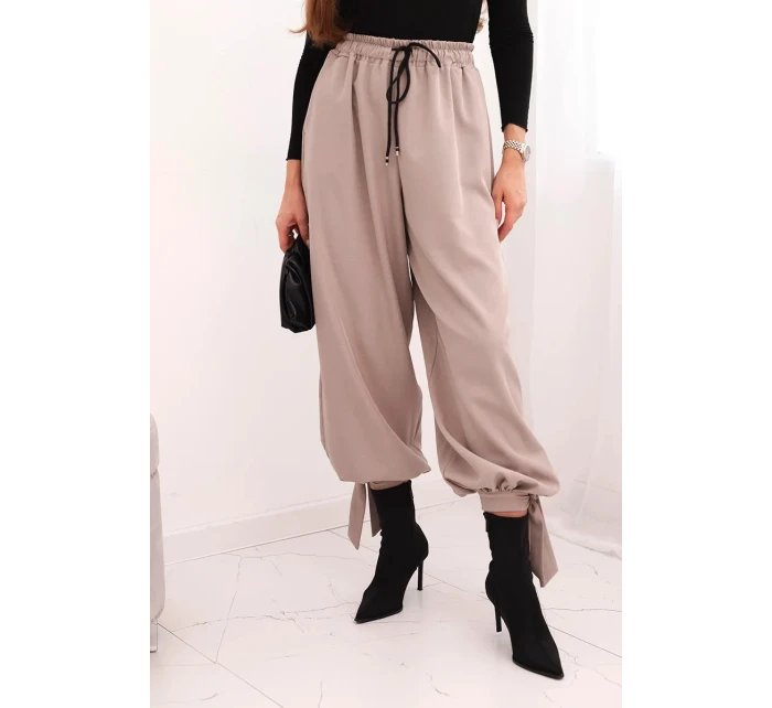 Dámské kalhoty se širokými nohavicemi a zavazováním dole fango
