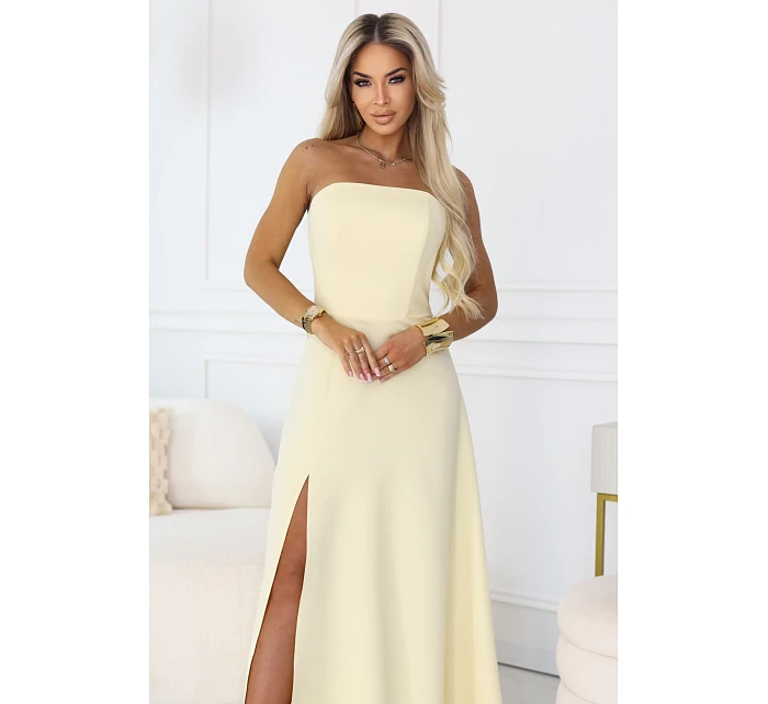 maxi šaty s rozparkem a zavazováním na zádech žluté model 22064816 - numoco maxi šaty s rozparkem a zavazováním na zádech žluté model 22064816 - numoco